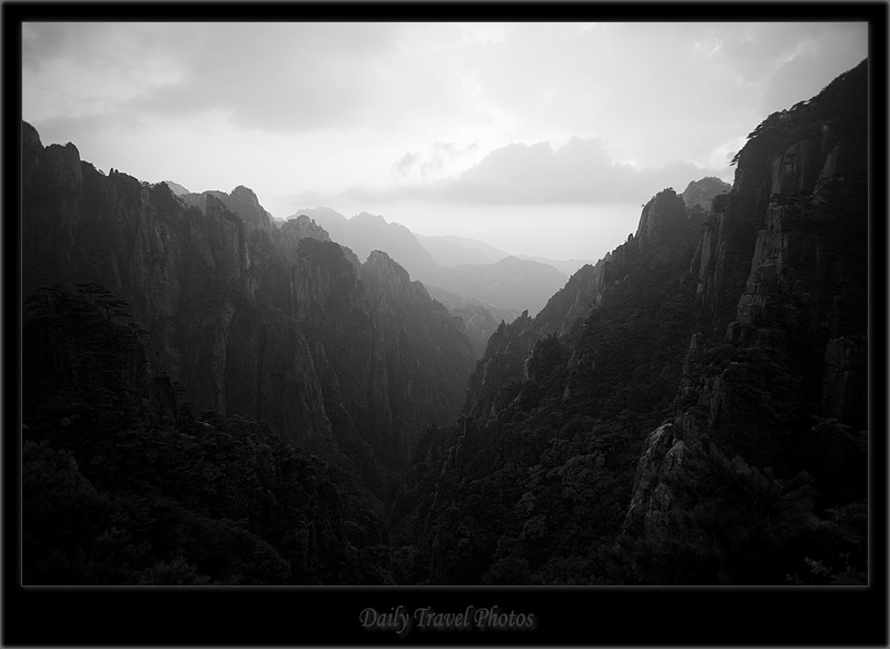 Misty valley of a mountain range - Huangshan, Zhejiang, China - Daily Travel Photos
