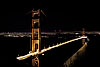 Famed Bridge Photo: The Golden Gate Bridge linking San Francisco to North Bay with a view of the city lights in the background.  This is definitely one of the more "mature" subjects that I will ever post but the beauty of photoshop allows anyone to put their own fresh spin on a subject that's a little long in the tooth (in a photographic sense).
