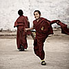 Strike Out Photo: A young monk celebrates a strike out during a cricket match at the Ghoom Monastery.