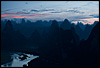 Sunset (Karsts III) Photo: Karst formations in southern China.