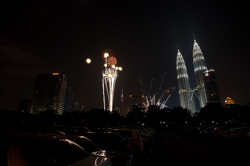 New Year's Eve Fireworks commence at the Petronas Towers at KL City Center.  - Kuala Lumpur, Malaysia - Daily Travel Photos