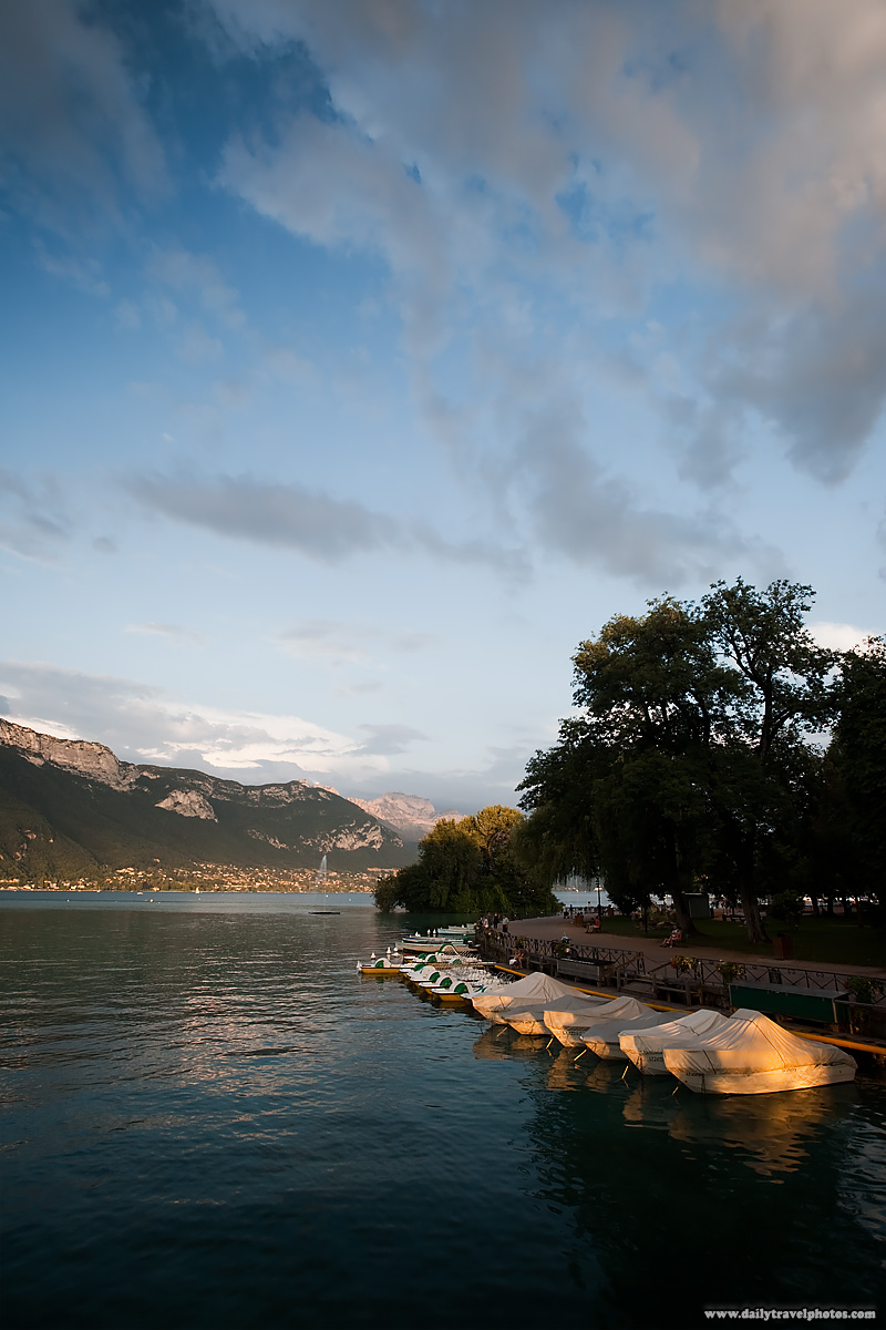 Annecy's beautiful lake lined by the Alps.- Annecy, France - Daily Travel Photos