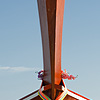 Bow Photo: Ribbons tied to the bow of a longtail boat.
