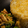Glutton's Grub Photo: Phad ka prao gai: Spicy basil leaf chicken with deep-fried egg, a blindingly spicy staple in Thai cuisine.