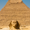 Sphinx Scale (Before/After) Photo: The Sphinx and the Pyramid of Khafre at an empty Necropolis complex in Giza, Egypt.