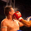 photo: Muy Thai Heavyweights - A solid left hook catches the French muay thai fighter square on the cheek.