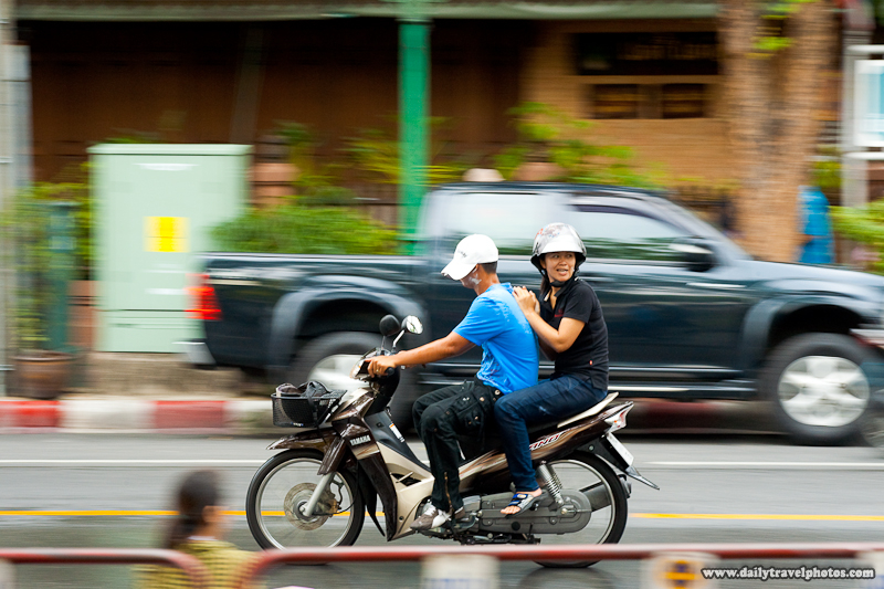 Motorcyclist Songkran Hat Sideways Protection Water Festival - Bangkok, Thailand - Daily Travel Photos