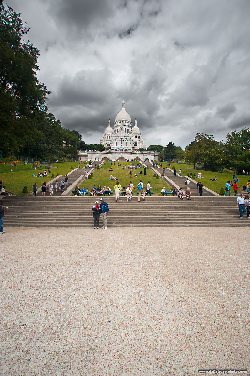 Looking Up at Sacre Coeur and Stormy Clouds from Base of Steps in Montmartre - Paris, France - Daily Travel Photos