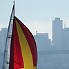 photo: Sailboat & SF Skyline - With the San Francisco skyline and Bay Bridge serving as a backdrop, a sailboat cruises into Oakland to dock (ARCHIVED PHOTO on the weekends - originally photographed 2006/06/23).