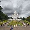 Stormy Heart (before/after) Photo: Stormy clouds form over Sacre Coeur Basilica atop Montmartre in Paris.