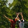 Pigskin Pile Photo: Opposing players are lifted for the ball at an amateur rugby tournament in America (ARCHIVED PHOTO on the weekends - originally photographed 2006/05/13).