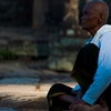 photo: Stoney Servant - A female Buddhist nun sits at the Bayon Temple in Angkor Wat in Cambodia (ARCHIVED PHOTO on the weekends - originally photographed 2007/05/18).