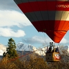 Alpine Air Photo: A tourist hot air balloon floats tethered over Annecy.